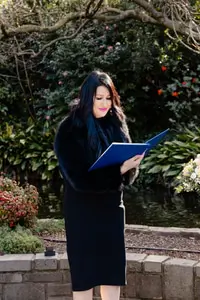 Melbourne marriage celebrant conducting intimate elopement ceremony at Treasury Gardens with couple celebrating 10 years of marriage