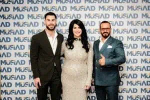 Gee What a Wedding founder with president and assistant Kenan at MUSIAD Awards intermission at The Langham Melbourne