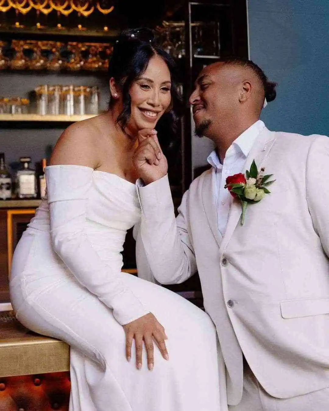 Melbourne wedding couple sharing a relaxed and intimate moment at their reception venue