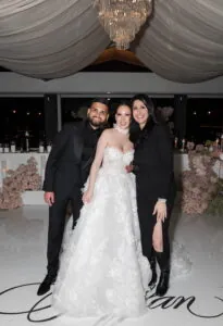 Melbourne wedding planner Gee with bride and groom on the dance floor at a luxury wedding at Carousel Albert Park – Gee What a Wedding