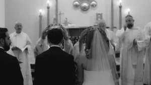Bride and groom receiving crowns during a Greek Orthodox wedding ceremony in Melbourne – Gee What a Wedding wedding planning and coordination