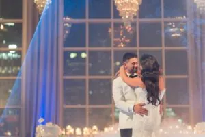 Wedding couple embracing at Metropolis Events Melbourne by Gee What a Wedding
